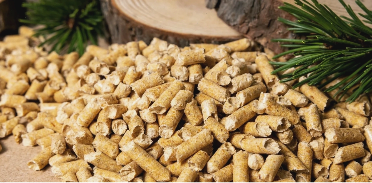 Recycled paper pellets on a rustic wooden surface