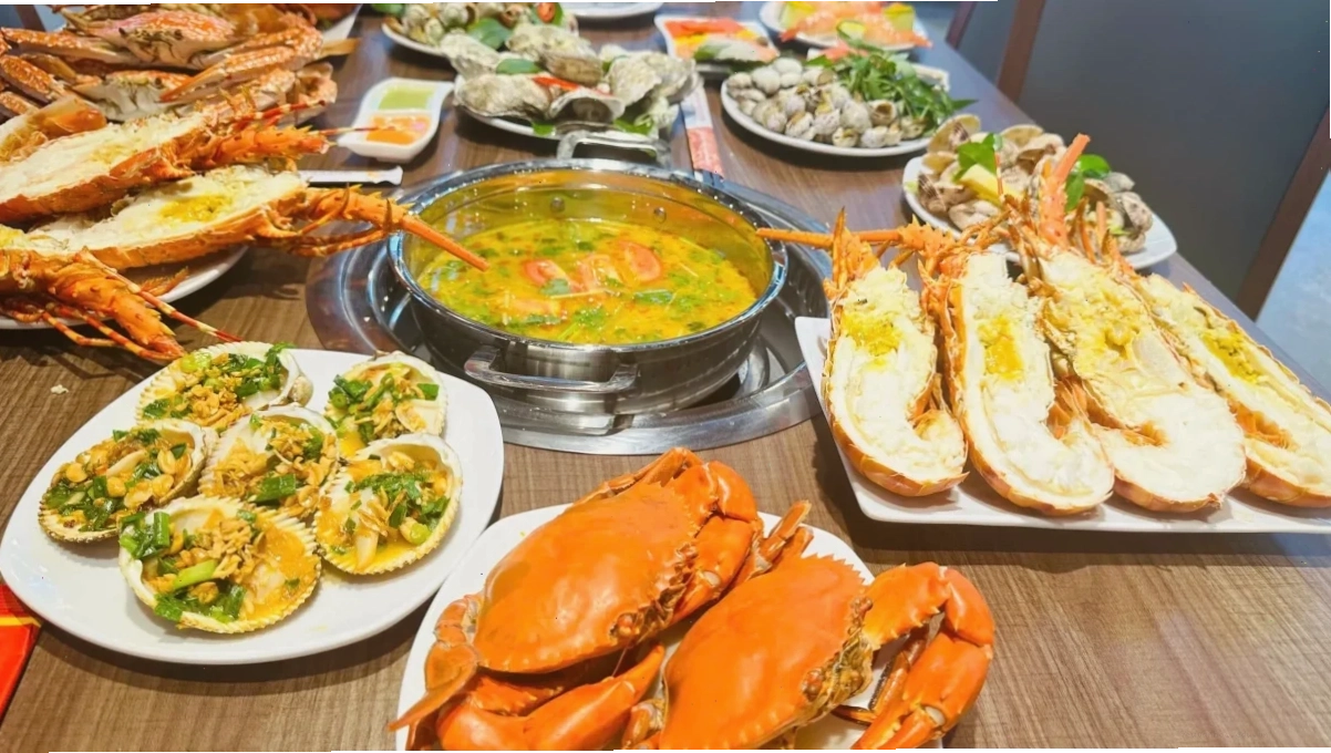 review nhà hàng hải sản ngon Nha Trang món ốc hương xào me